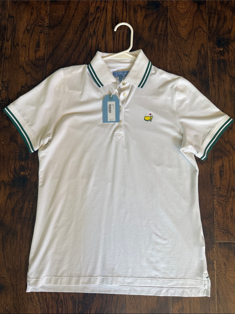 Masters women’s Magnolia Lane White Polo with Green Trim and Embroidered Logo, m